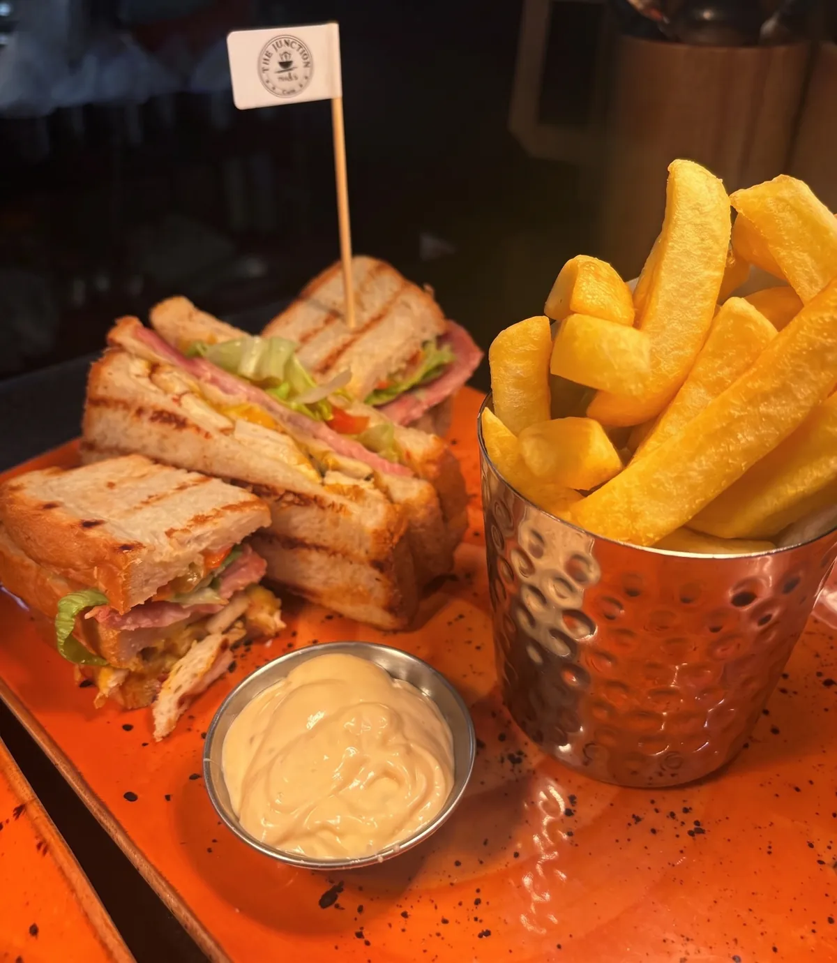 Club sandwich with chunky chips and dip