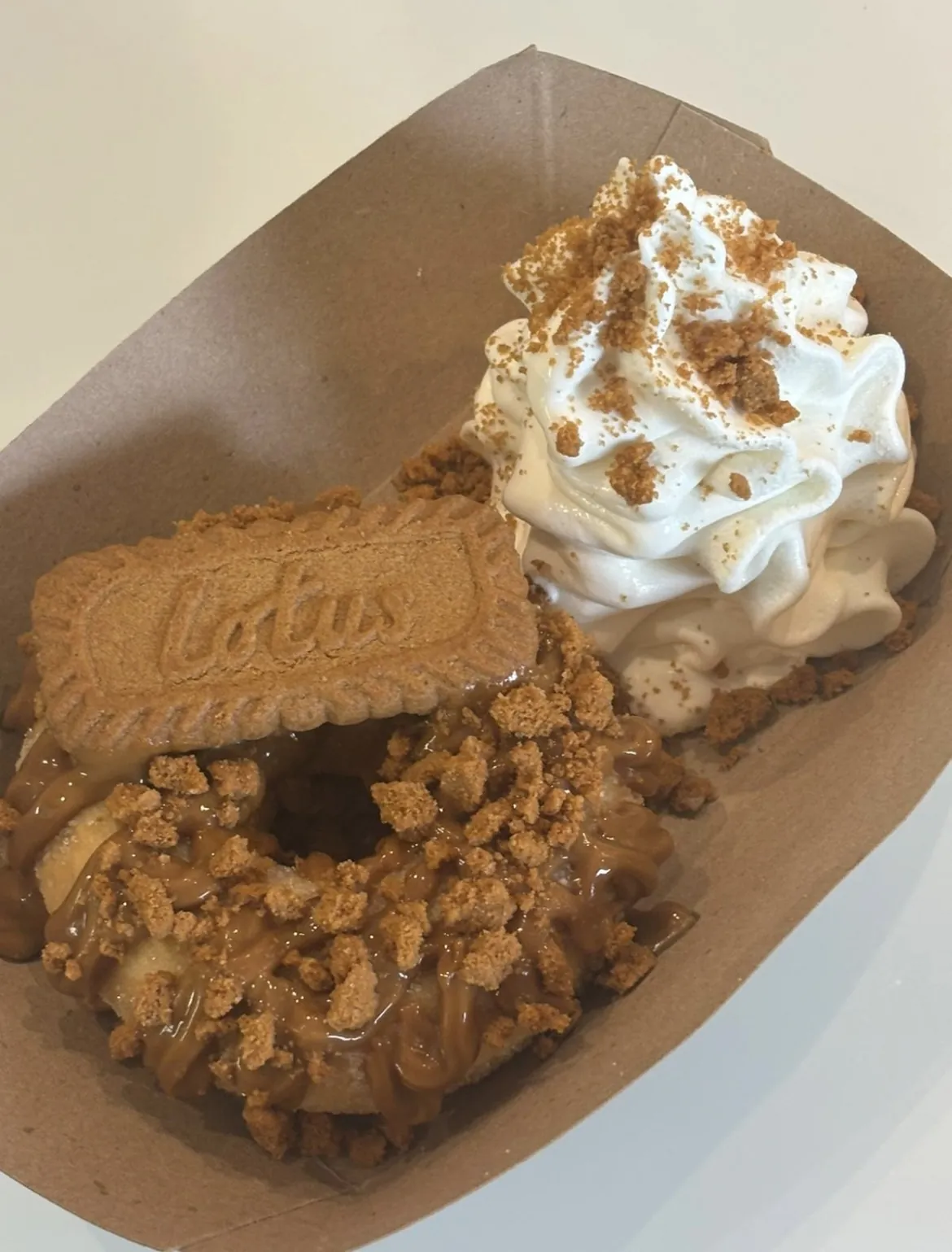 Lotus biscuit sweet boat with whipped cream