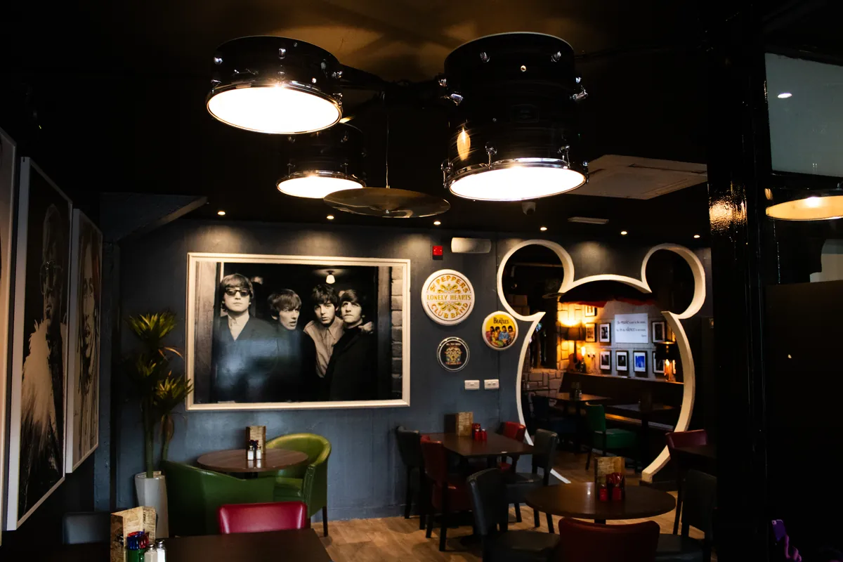 The dining room with the Beatles print and the Mickey-ear doorway