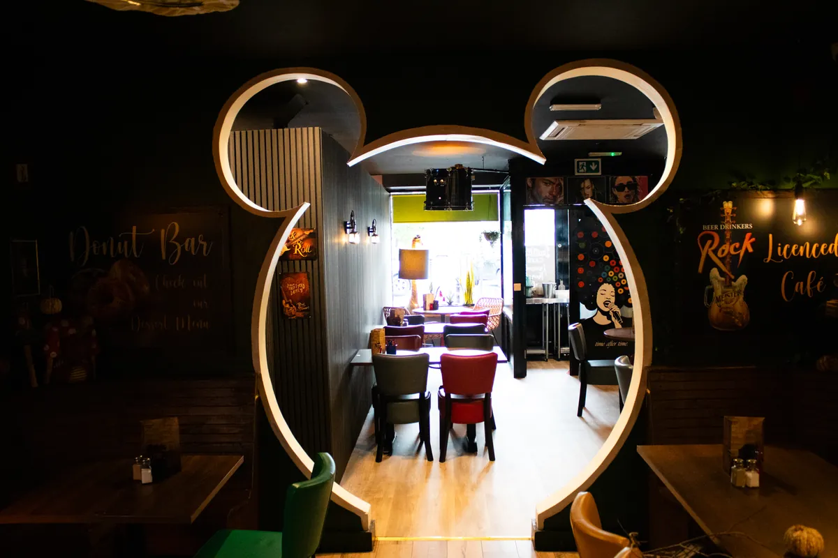 A Mickey-ear doorway between the rooms.
