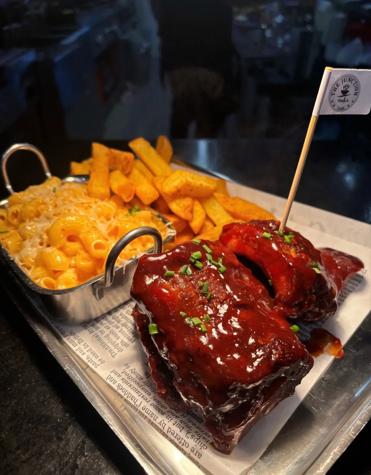 BBQ rack of ribs with mac n’ cheese and fries